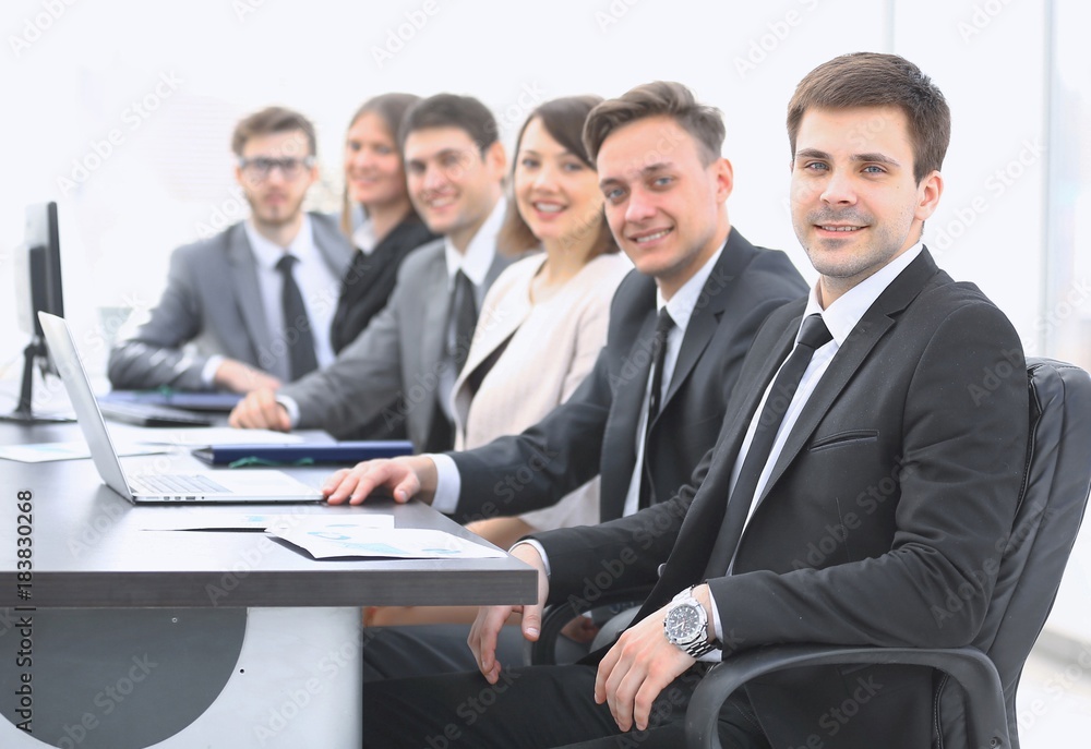 project Manager and professional business team sitting at Desk project Manager and professional business team sitting at Desk