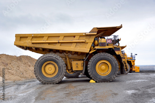 heavy-duty dump truck for transportation of soil, overburden and ore on construction sites and quarries