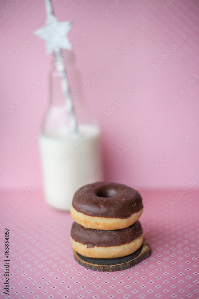 Donuts and milk in a botlle Donuts and milk in a botlle