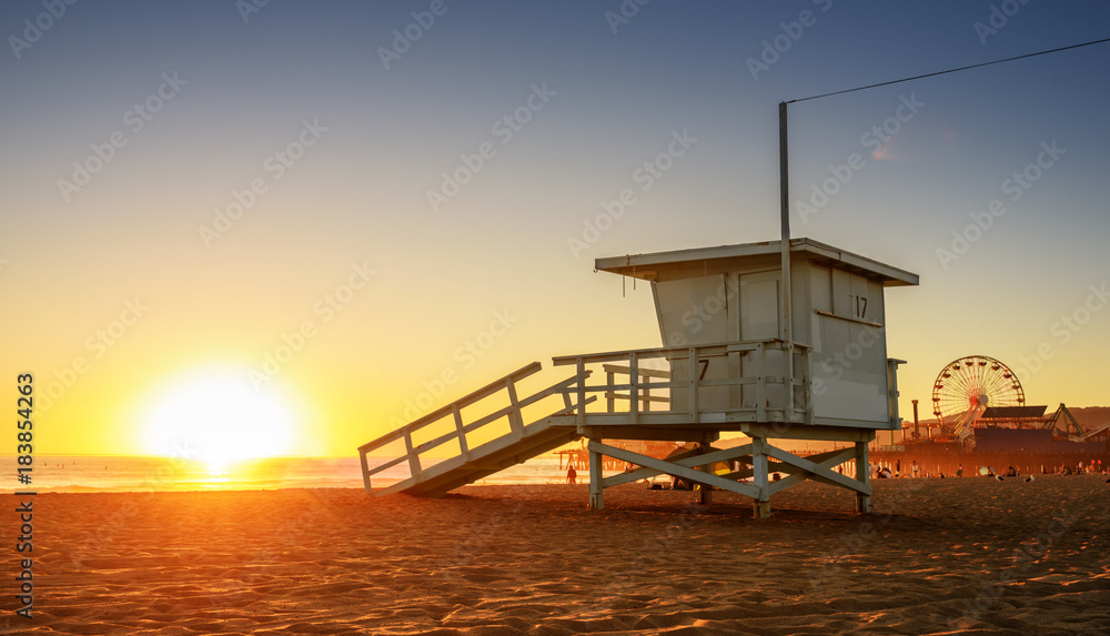 Santa Monica beach lifeguard tower in California USA at sunset