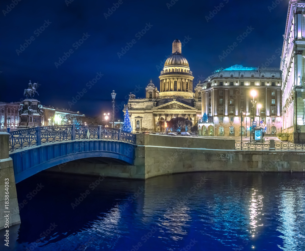 Saint Petersburg. Russia. Winter and new year in Russia. St. Isaac's Cathedral with a New Year Tree. Petersburg bridges and canals.