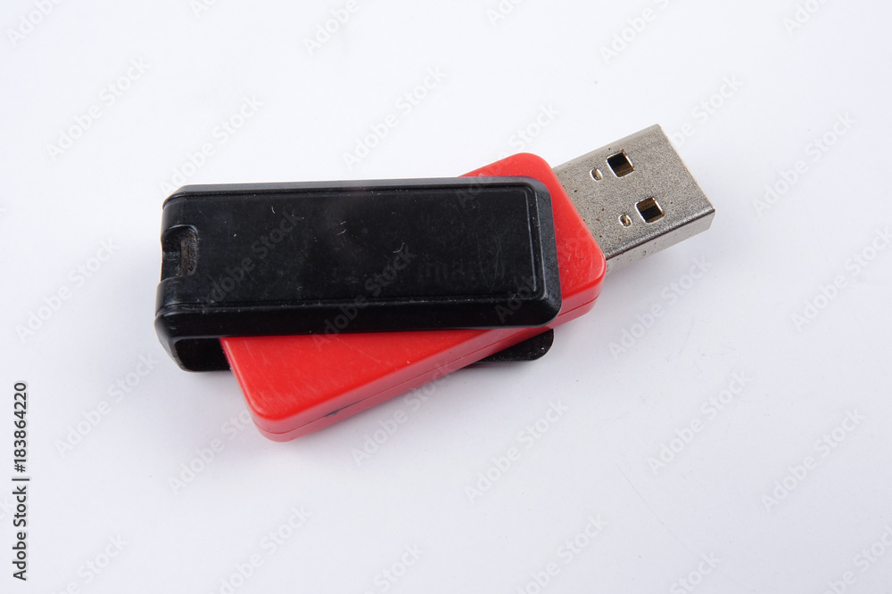 Black and red flash drive isolated on white background. Black and red flash drive isolated on white background.