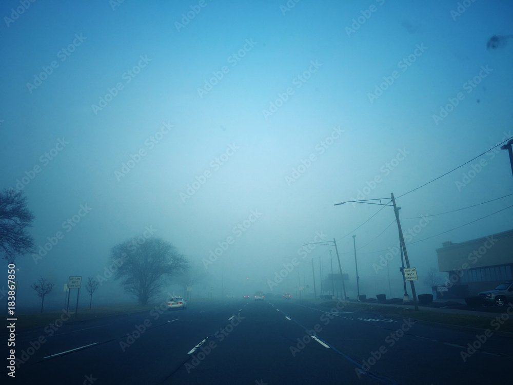 Foggy empty road