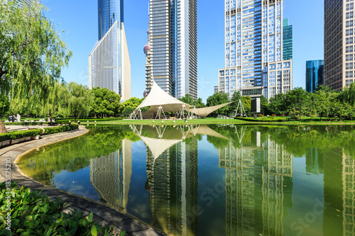 Shanghai commercial district modern urban architecture and green city park,China