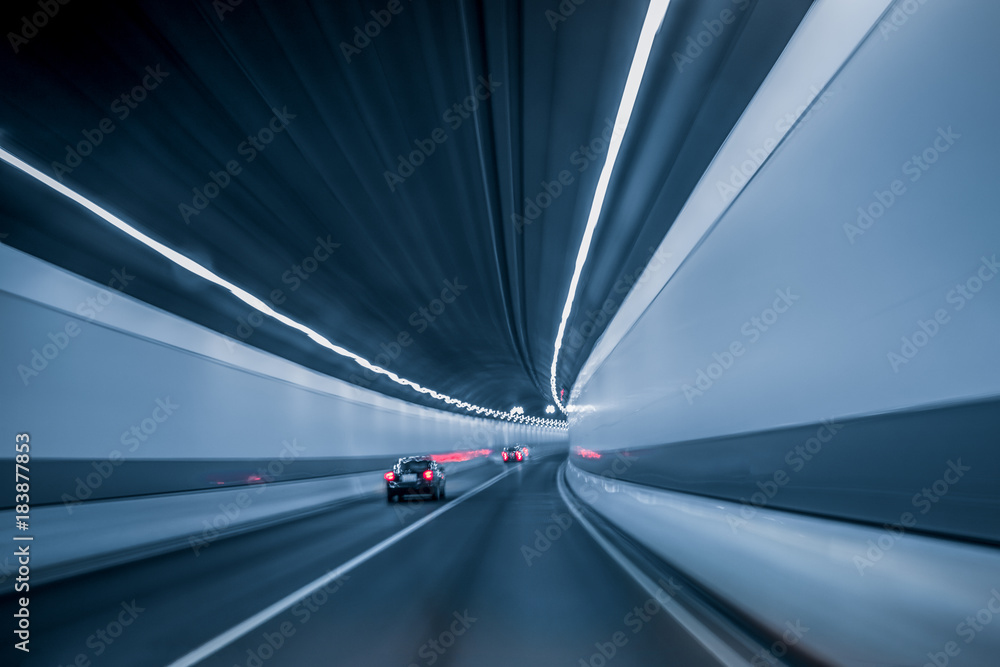 Fototapeta premium Motion blur of car moving inside tunnel