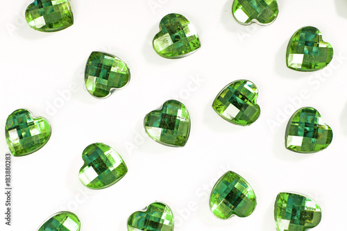 Green Rhinestone background. Heart shape texture as backdrop isolated white s...