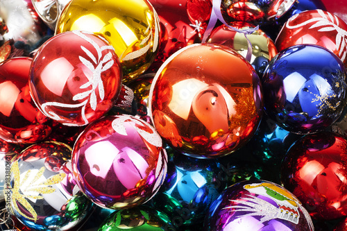 Christmas bauble vintage glass ball ornaments. Blue yellow,red,green,pink,orange,gold, shiny reflective mirrored glass balls. Colorful christmas wallpaper.