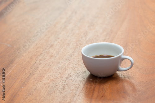 White Coffee cup on wooden table