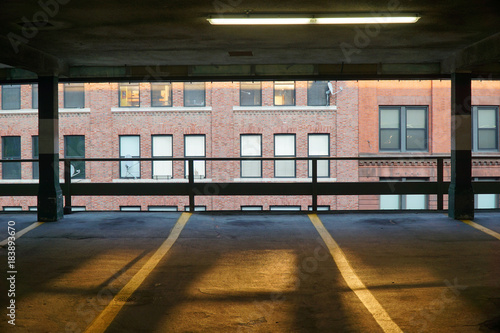 sunlight and shade in parking lot in the city