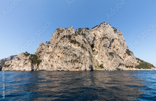 The Island of Capri is a very picturesque, luxuriant and extraordinary location in Italy famous for its high rocks.