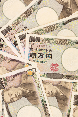 Japanese currency yen bank notes. The yen is the official currency of Japan. It is the third most traded currency in the foreign exchange market after the United States dollar and the euro photo