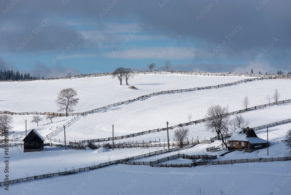 Small winter village in the mountains Small winter village in the mountains