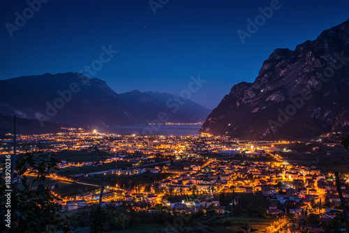 View of the beautiful Lake Garda .Riva del Garda town and Garda lake by night, Italy