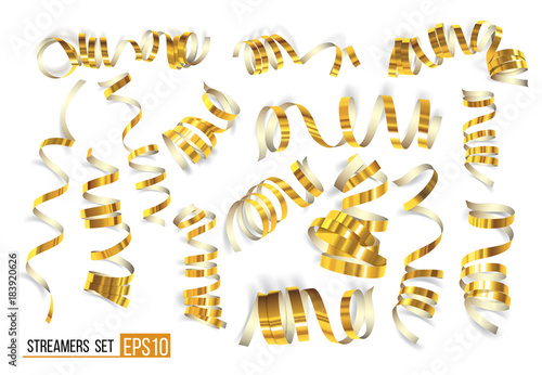 Set of gold curling streamers on white