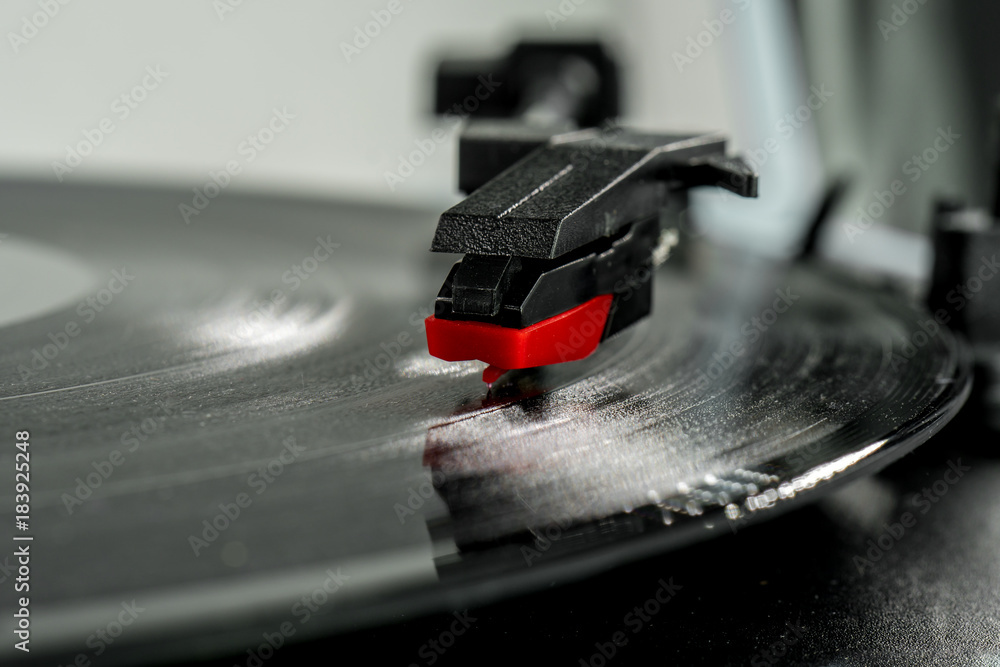 turntable stylus macro detail, needle reading the vinyl. Old record player  stylus on a rotating disc, vintage. Stock Photo | Adobe Stock