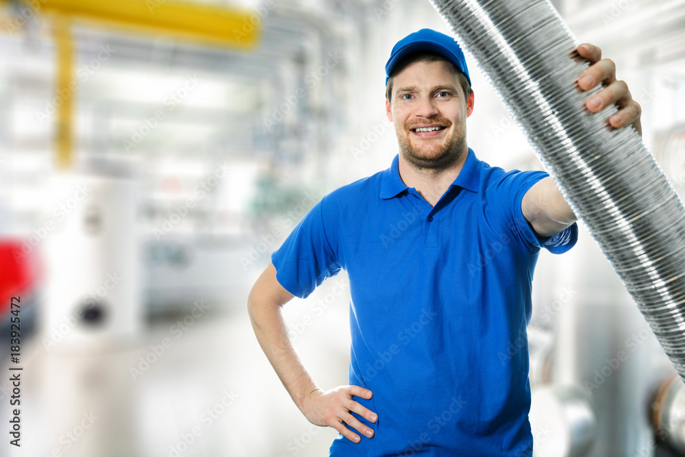 hvac technician with flexible aluminum ducting tube in hand hvac technician with flexible aluminum ducting tube in hand