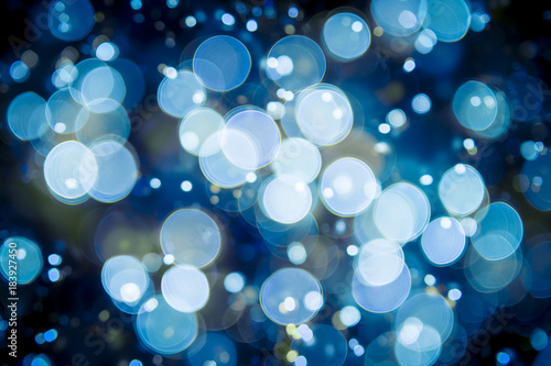 Photography Winter holiday background in an abstract defocus ice blue bokeh
