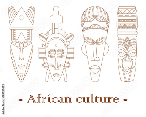 Set of four traditional African masks on a white background.