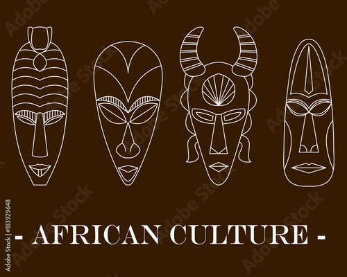 Set of four traditional African masks on a brown background.