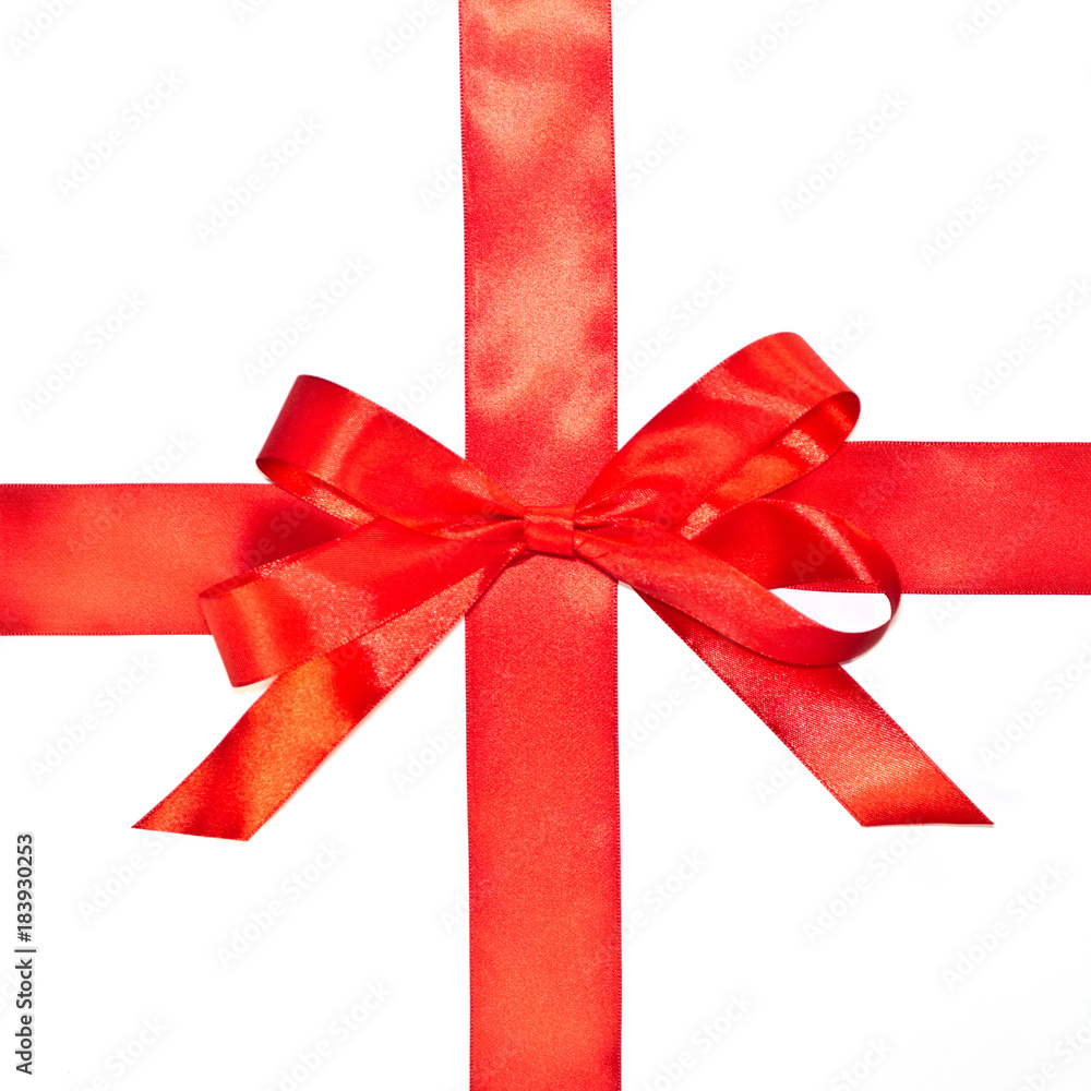 Shiny red bow and ribbon isolated on white background Shiny red bow and ribbon isolated on white background