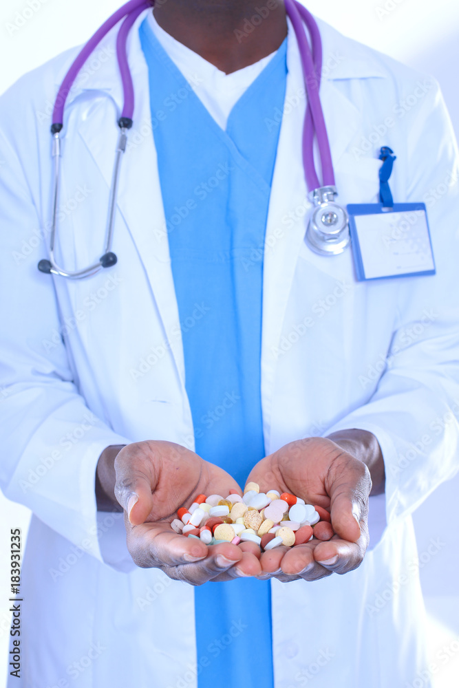 Pill in a hand isolated on white background. Doctor. Pill Pill in a hand isolated on white background. Doctor. Pill