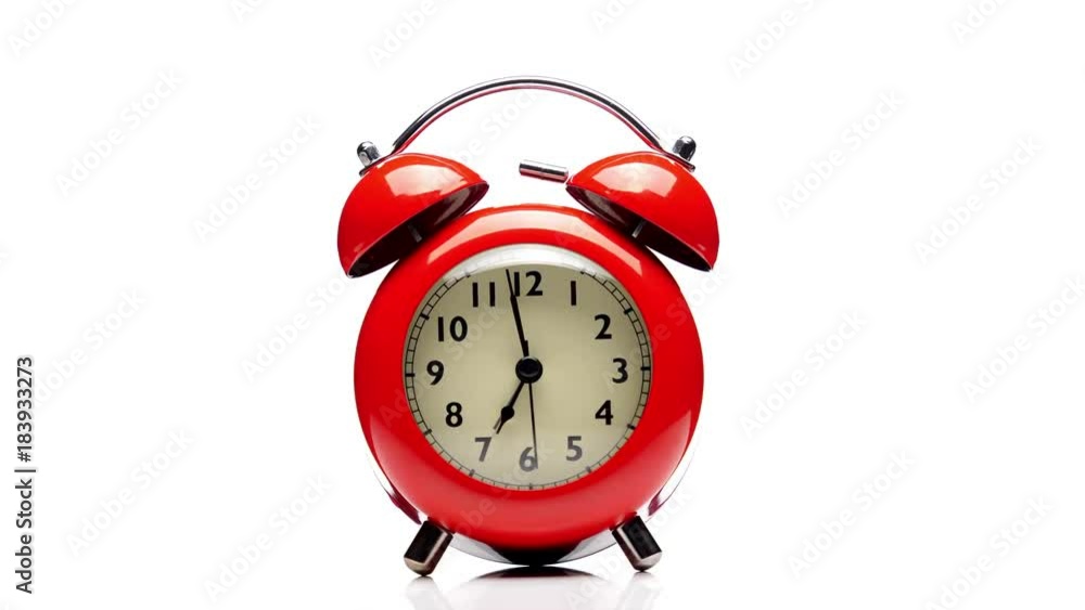 Red alarm clock. Close up view.
Red alarm clock. Close up view.