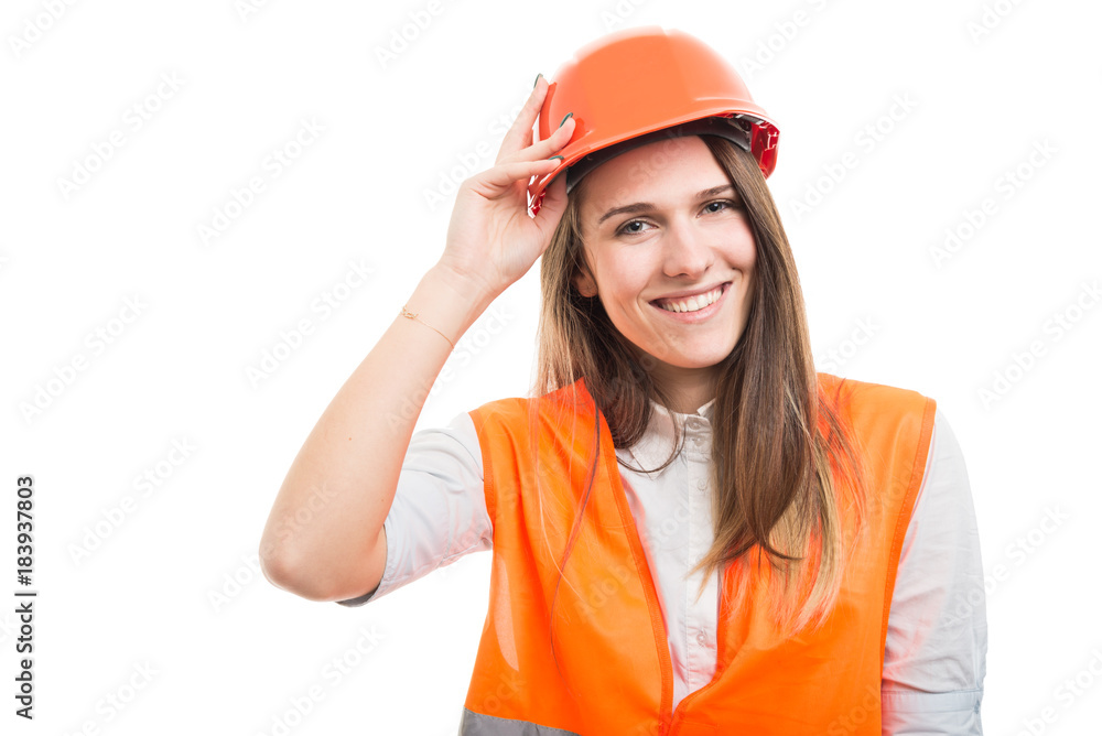 Beautiful girl architect posing happy with protection uniform Beautiful girl architect posing happy with protection uniform