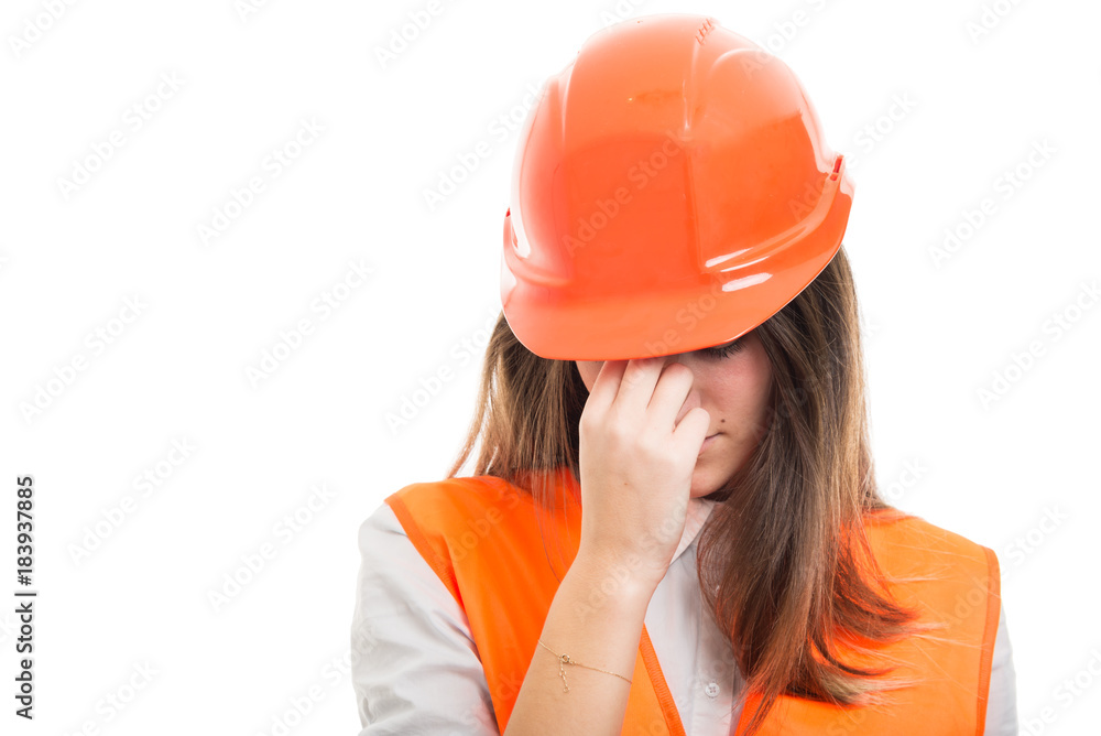 Engineer girl with hardhat got headache Engineer girl with hardhat got headache