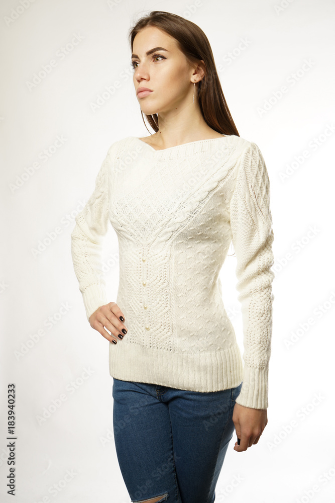 girl in white sweater on white background girl in white sweater on white background