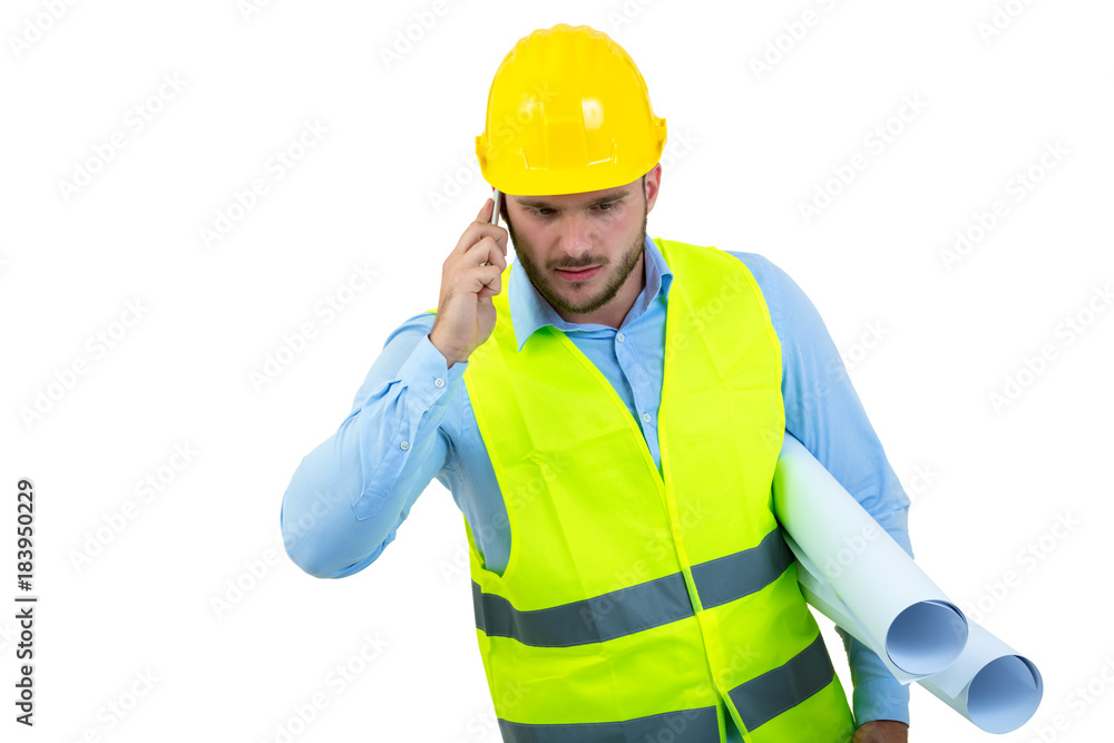Angry upset young construction engineer yeling at the phone Angry upset young construction engineer yeling at the phone