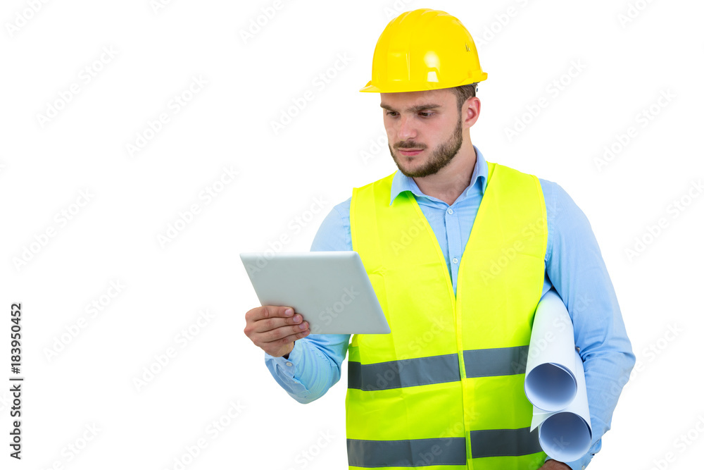 Handsome engineer working with a tablet pc, isolated on white Handsome engineer working with a tablet pc, isolated on white