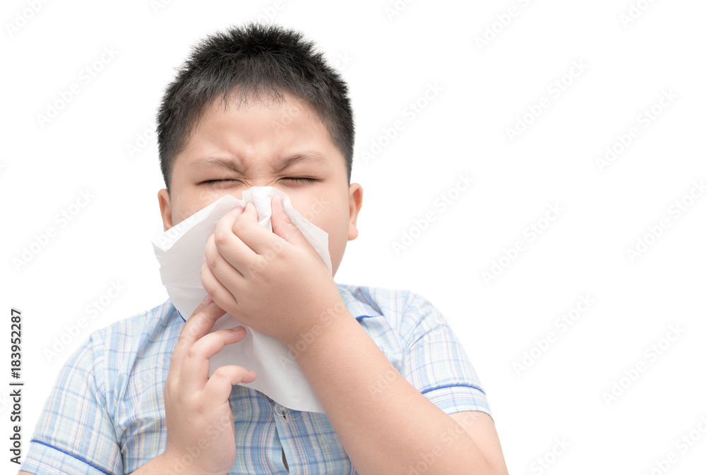 Obese boy got nose allergy, flu sneezing nose isolated Obese boy got nose allergy, flu sneezing nose isolated