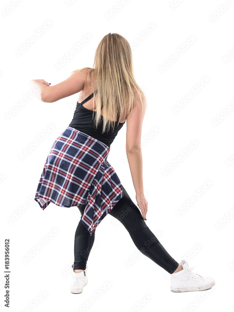 Back view of elegant graceful movement of blonde caucasian woman dancing jazz dance. Full body length portrait isolated on white background. Back view of elegant graceful movement of blonde caucasian woman dancing jazz dance. Full body length portrait isolated on white background.