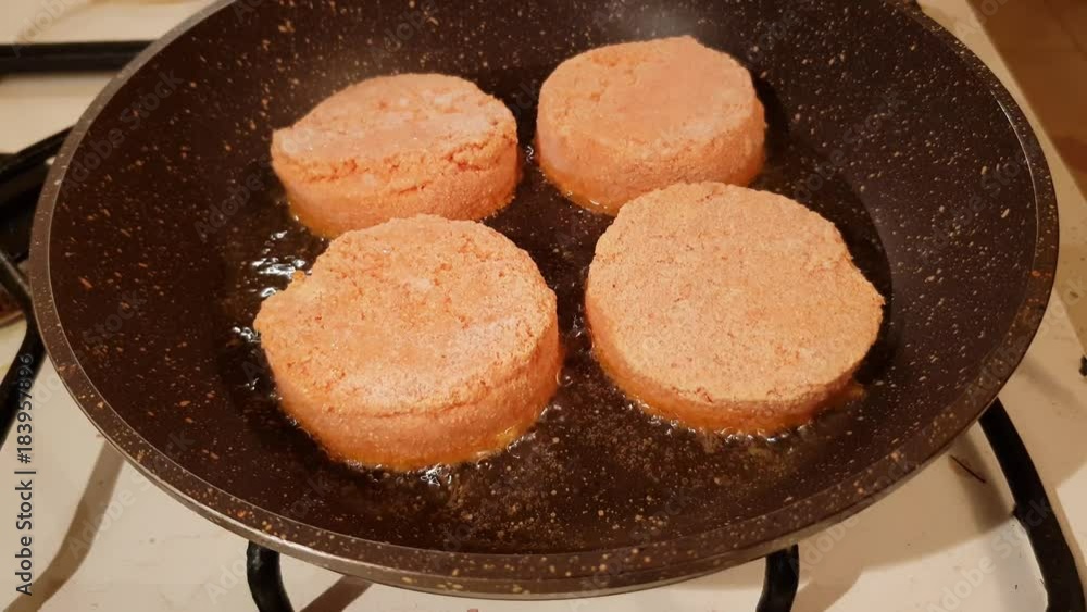 Juicy appetizing cutlets from carrots are fried in oil in a frying pan
Juicy appetizing cutlets from carrots are fried in oil in a frying pan