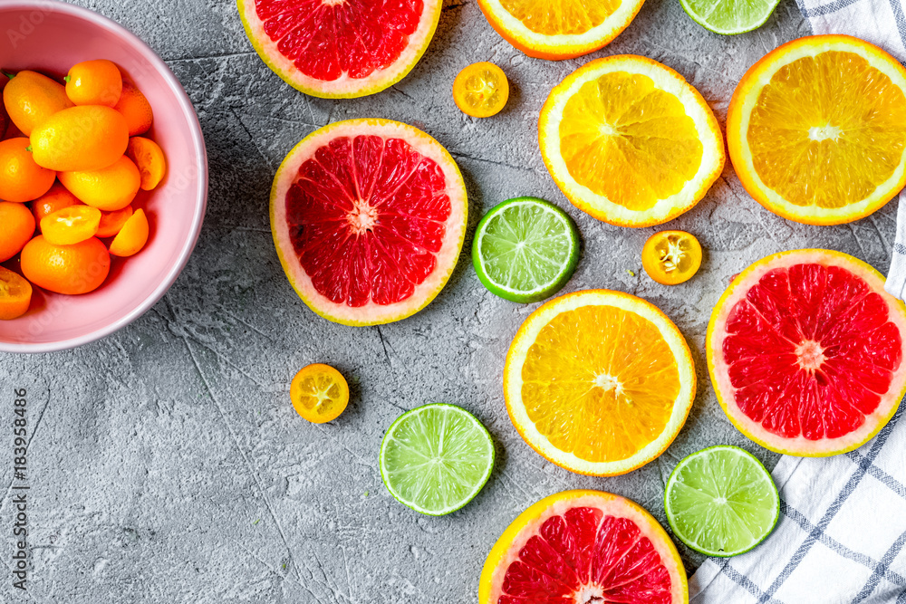 design with blood orange and lime on gray background top view mo design with blood orange and lime on gray background top view mo