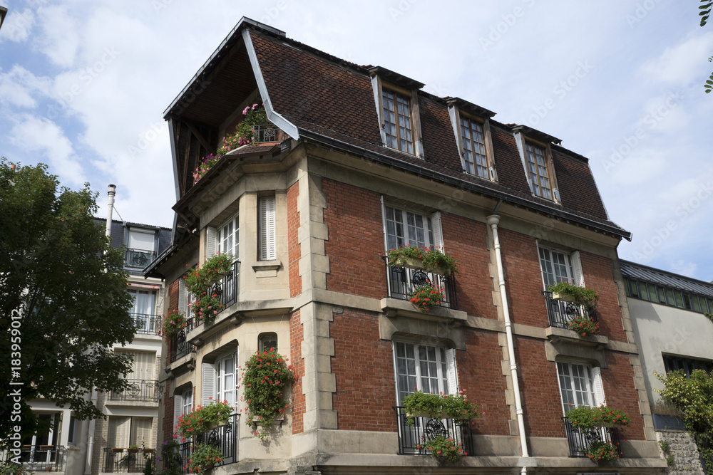 Fototapeta premium Maison en brique et pierre