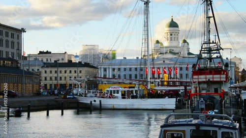Helsinki, Finland. Port of Helsinki, Finland in the evening, fast pacing clouds over the Cathedral