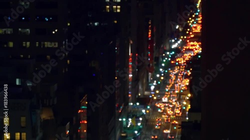 A night real time shoot of traffic jam in New York City filmed from the tall house at Fifth Avenue. Bokeh effect.