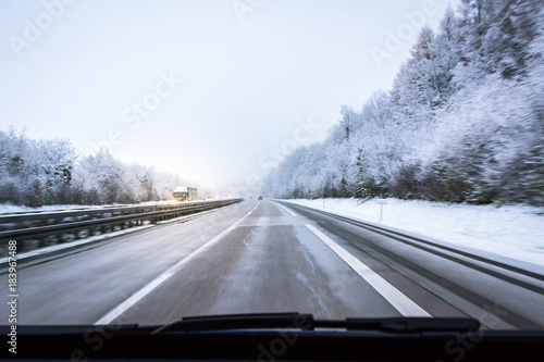 Car Driving on Snowy Road Highway Autobahn German Transportation Germany European Dashboard View