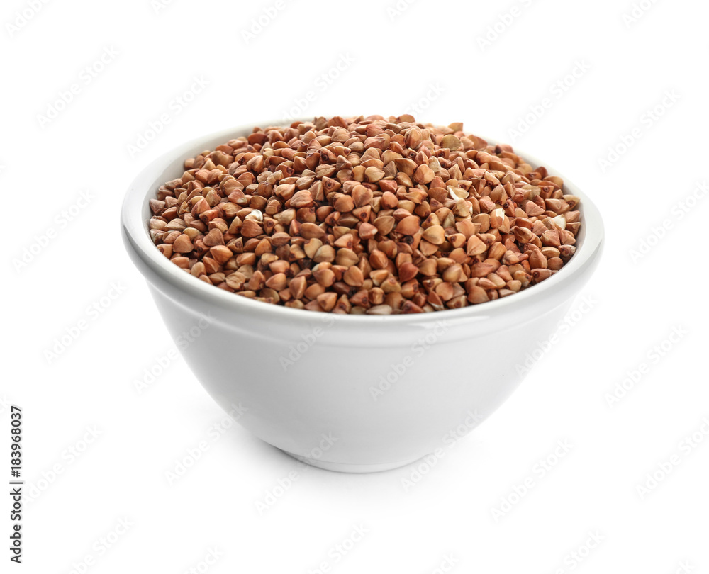Bowl with raw buckwheat on white background Bowl with raw buckwheat on white background