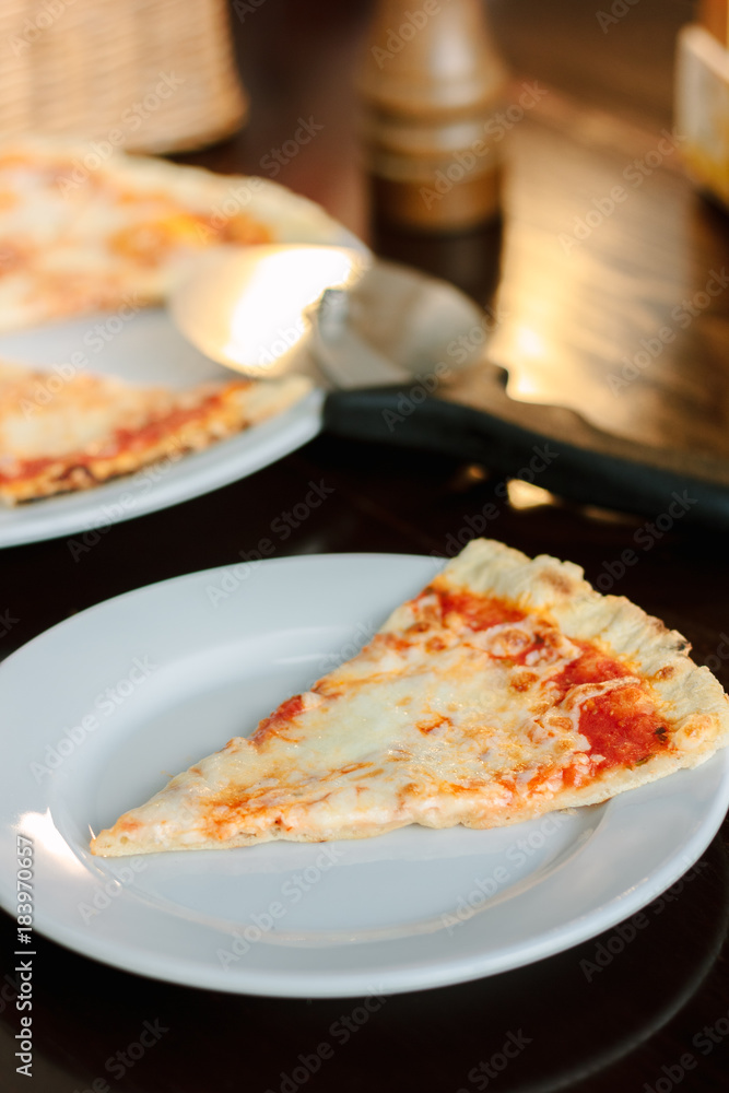 Pizza four cheese on white ceramic plate. Pizza four cheese on white ceramic plate.