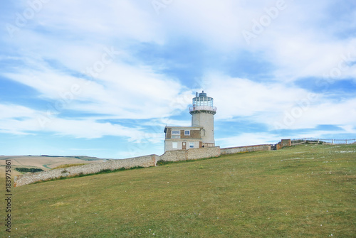 Belle Tout Lighthouse on summer cloudy day, Seven Sisters country park, Eastblurne, East Sussex, England, UK.