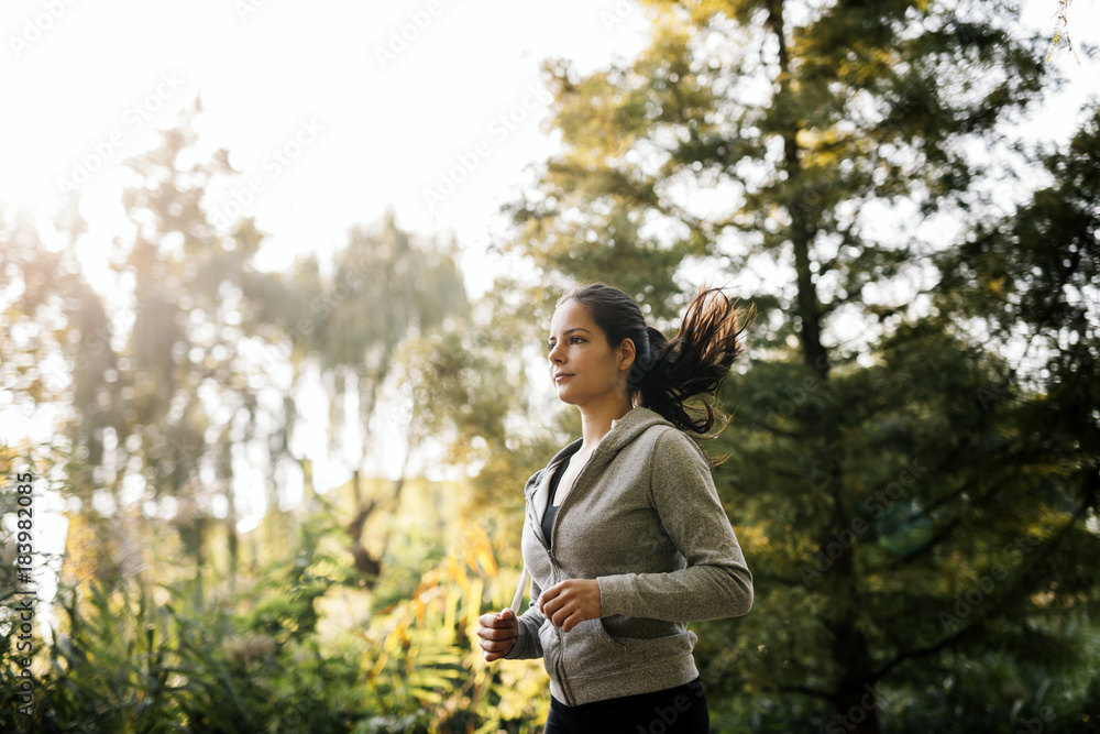 Woman running in park