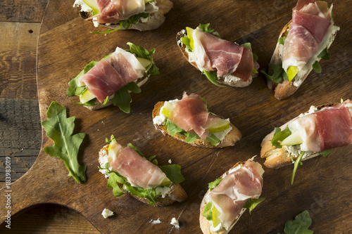 Homemade Prosciutto Pear Cheese Crostini photo