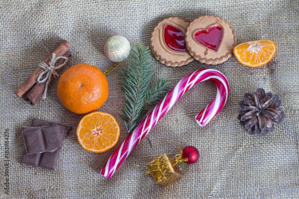 New Year's composition with cane and mandarins New Year's composition with cane and mandarins