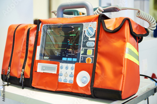 Modern portable biphasic defibrillator photo