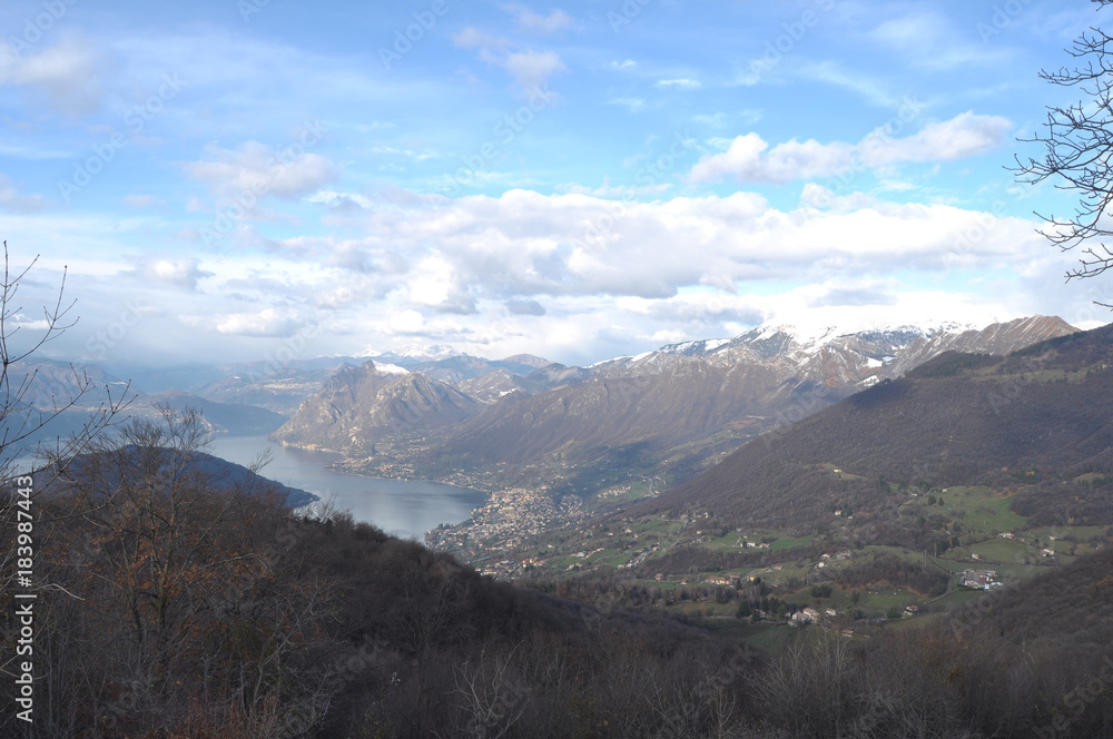 Panoramic image of Valcamonica with Lake Iseo and in the background the snow-capped mountains - Brescia - Italy 04