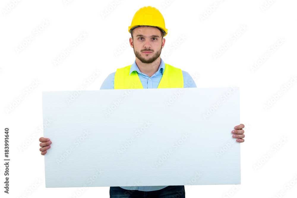 Happy male engineer holding an advertisement blank banner. Isolated on white background Happy male engineer holding an advertisement blank banner. Isolated on white background
