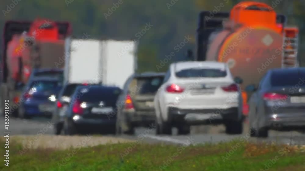 Track. The movement of vehicle on a road. Car traffic. Highway in summer day. Cars on a country road. Cars moving in two directions on highway. 4 k Track. The movement of vehicle on a road. Car traffic. Highway in summer day. Cars on a country road. Cars moving in two directions on highway. 4 k
