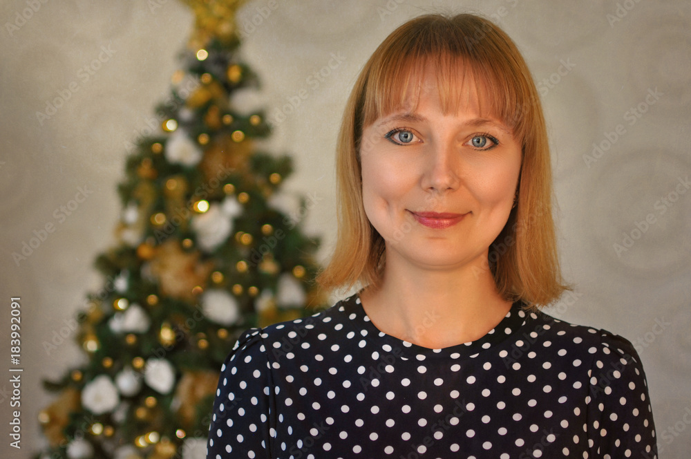 Portrait of a girl with a Christmas tree Portrait of a girl with a Christmas tree